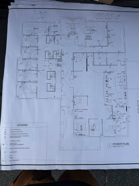 Architectural power plan blueprint showing electrical layout and wiring diagrams for a building floor