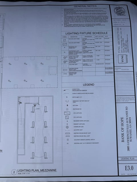 Architectural lighting plan for mezzanine level showing fixture layout, schedule, legend, and general notes on technical drawing